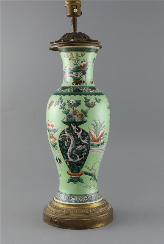 A Chinese Hundred Antiques lime green ground vase, 19th century, converted to a lamp, overall H.51.5cm